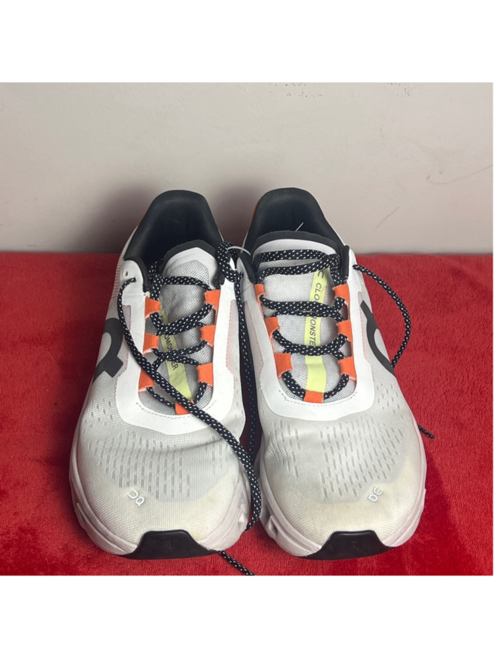 On Clouds orange and white womens shoes